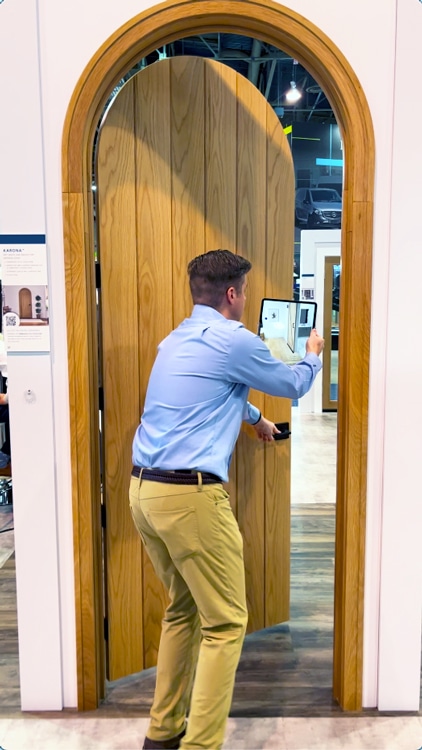 An AR portal demonstration at the JELD-WEN trade show exhibit